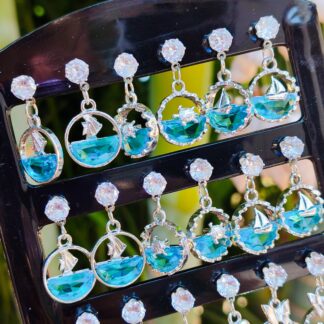 Aros colgantes estilo mar plateados