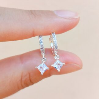 Argollas con dijes acero blanco